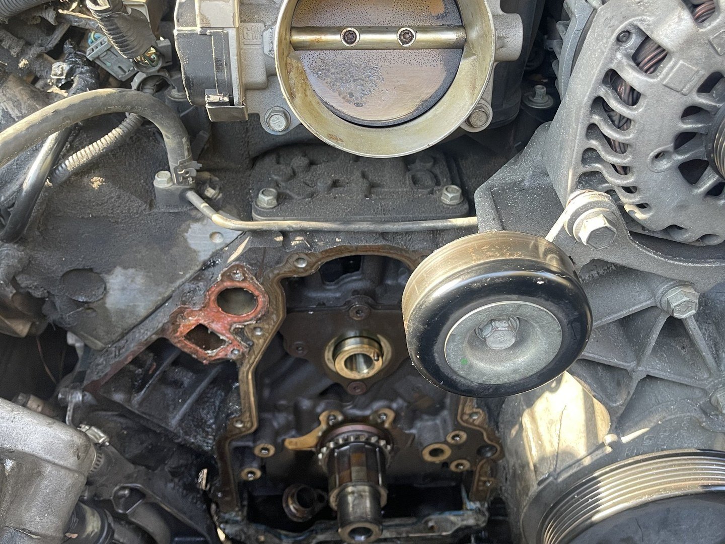 Front of an engine opened up during a timing chain and internal water pump replacement